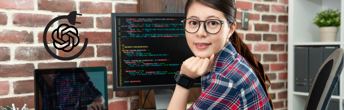 A woman is sitting in front of a computer with code on it.
