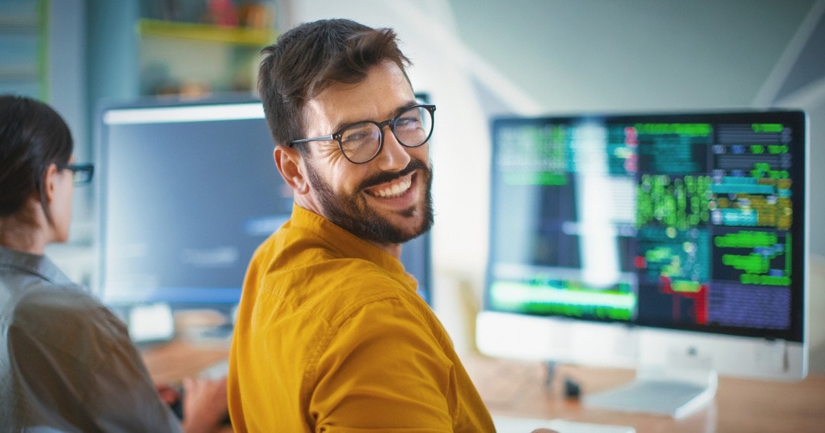 developer-working-on-pc-geekflare
