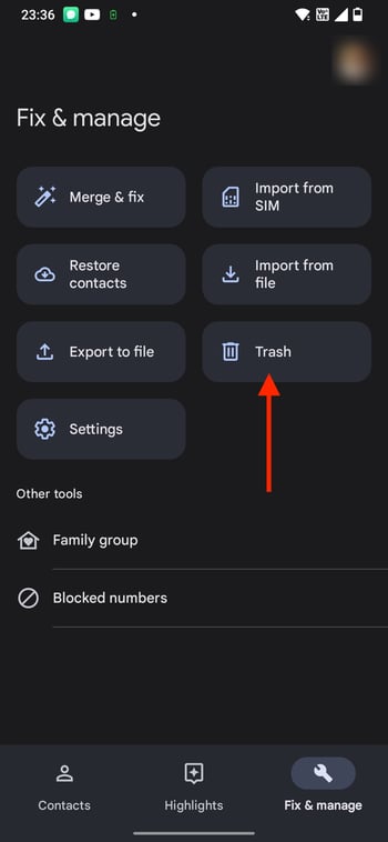 A screenshot of a phone with the google contacts fix & manage option highlighted.