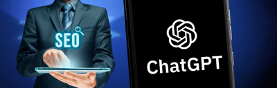 A man in a suit is holding a phone with the chatgpt plugin logo on it.